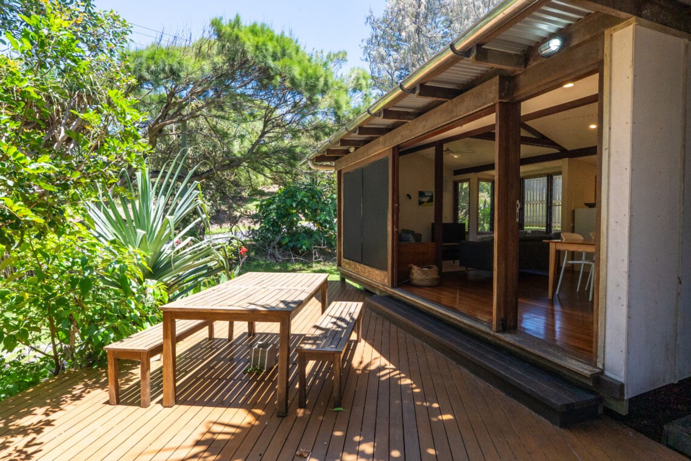 Timber deck with outdoor dining table and benches